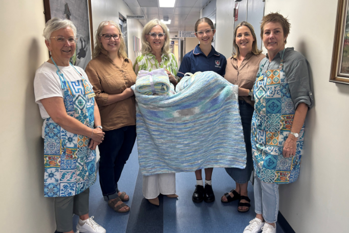 Teen knits warmth and hope for babies in need